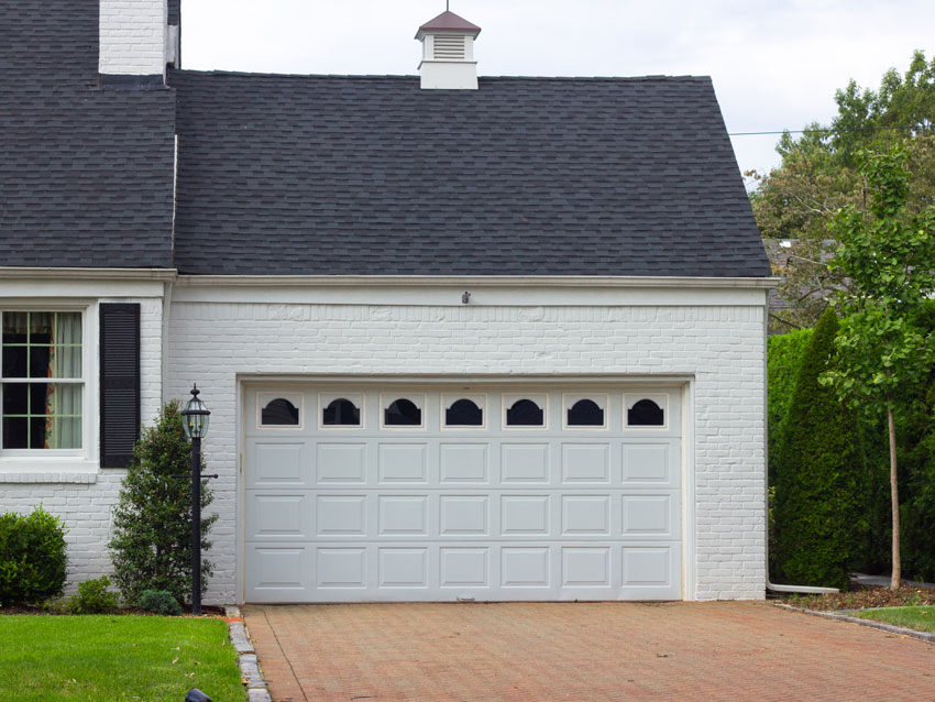 Add more value to your house! Install a new garage door before selling it.